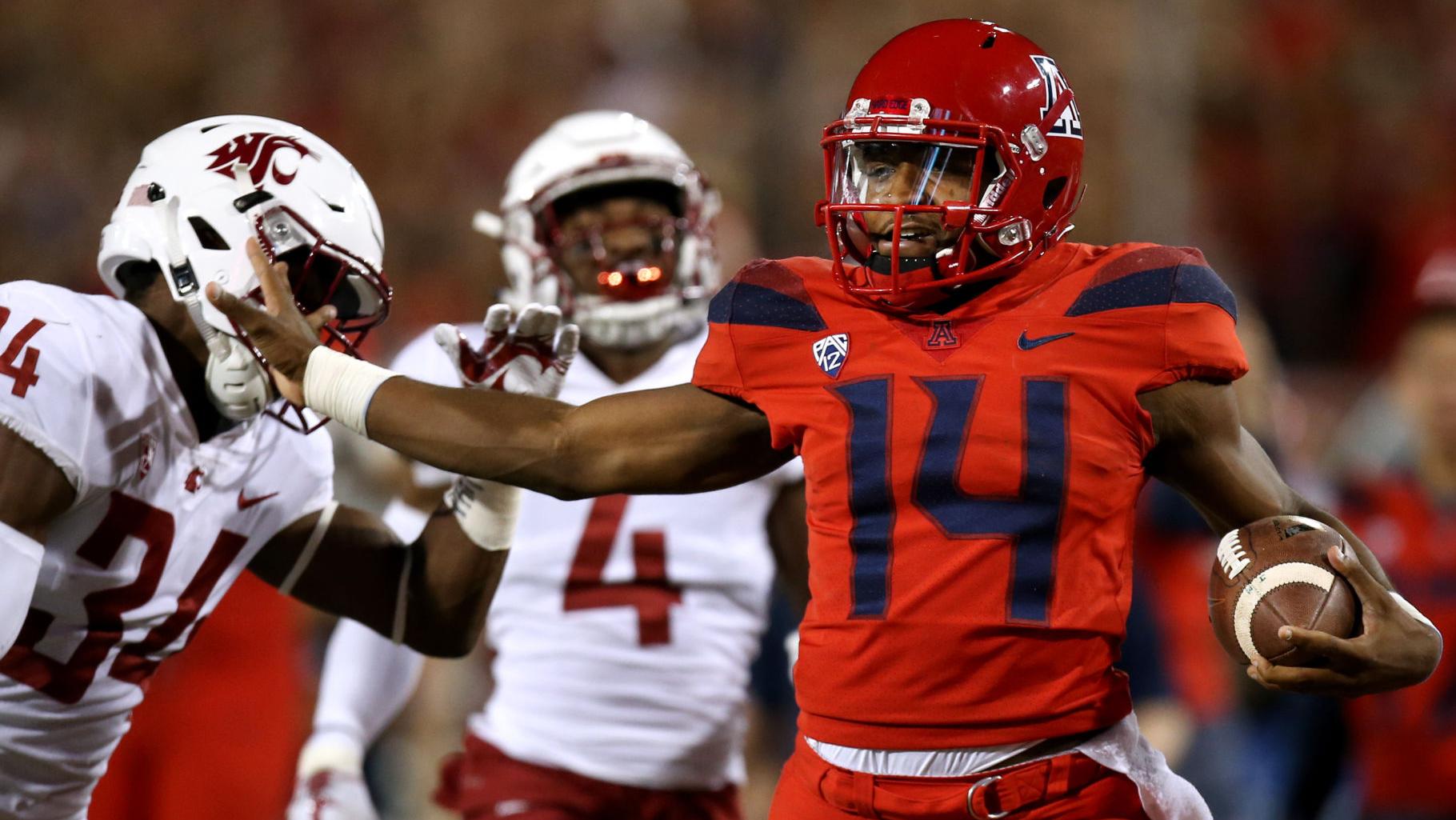 Bowled over: Khalil Tate, J.J. Taylor run Wildcats past 15th-ranked Wazzu, 58-37